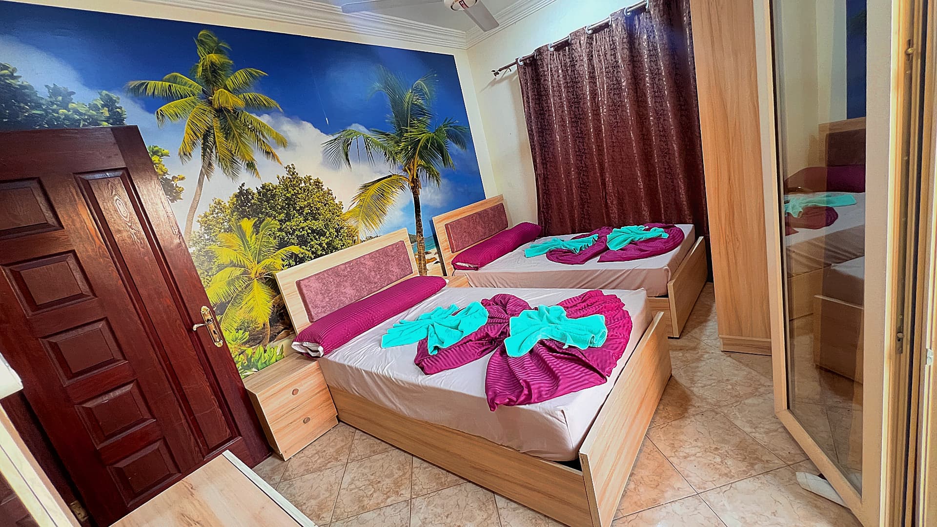 Two single beds in the second bedroom