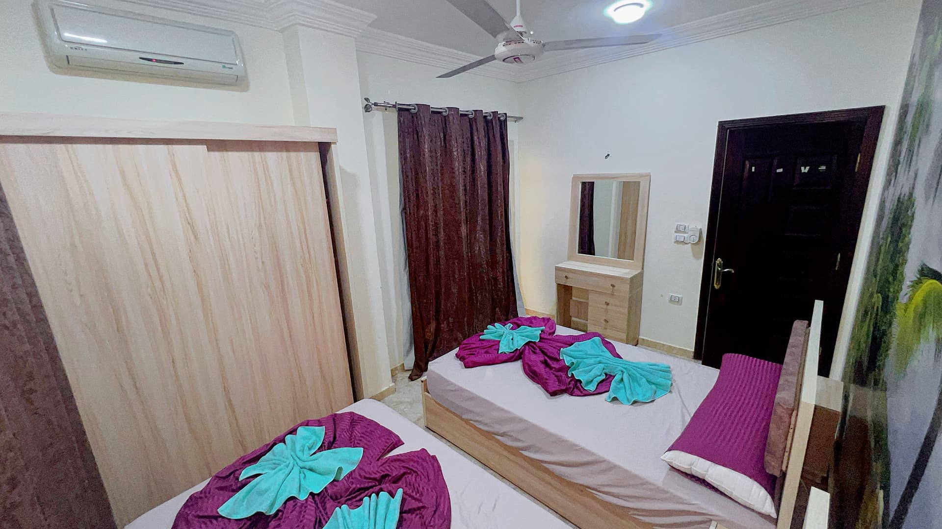 Bright bedroom with two single beds